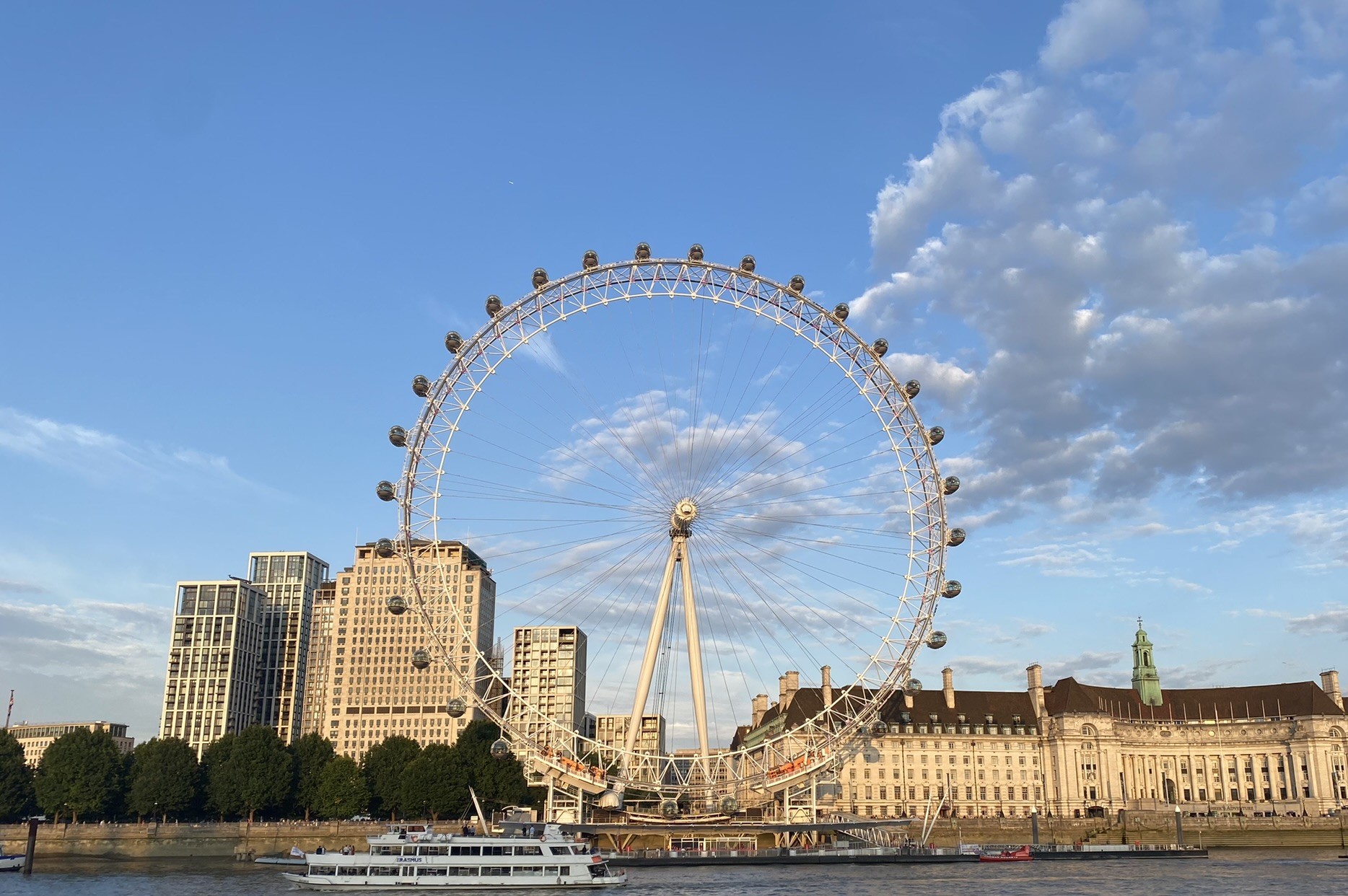 Photo taken of the London Eye during a clear day.