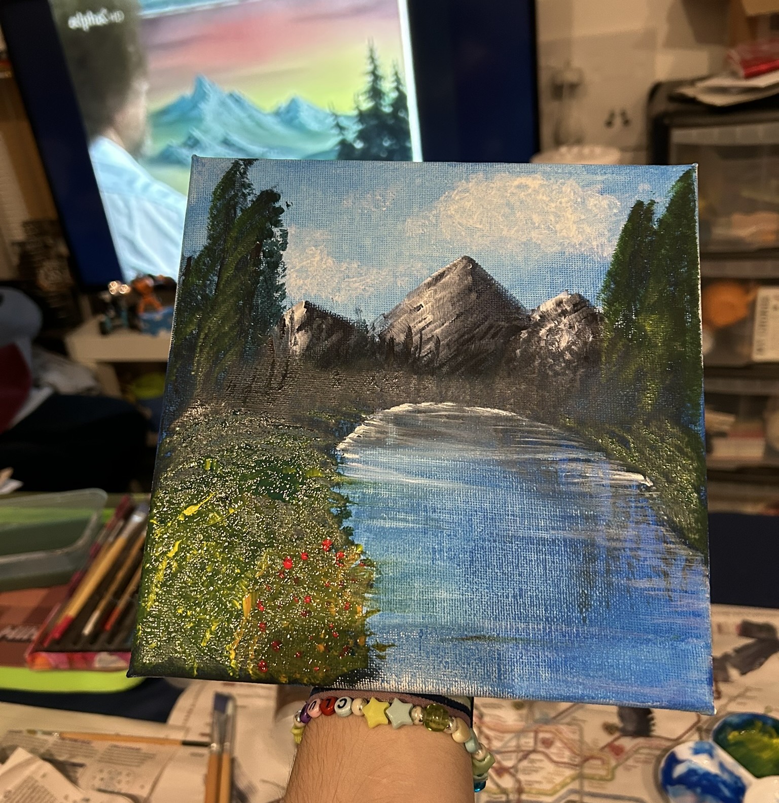 Photo of a painting by Clum following a Bob Ross video.